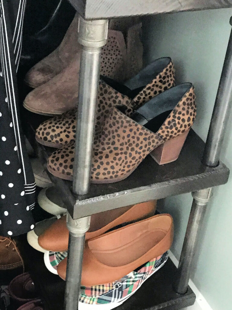 shoes on industrial style closet shelf