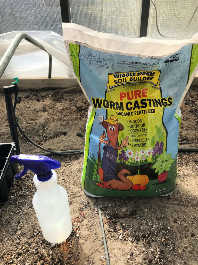 worm castings and spray bottle