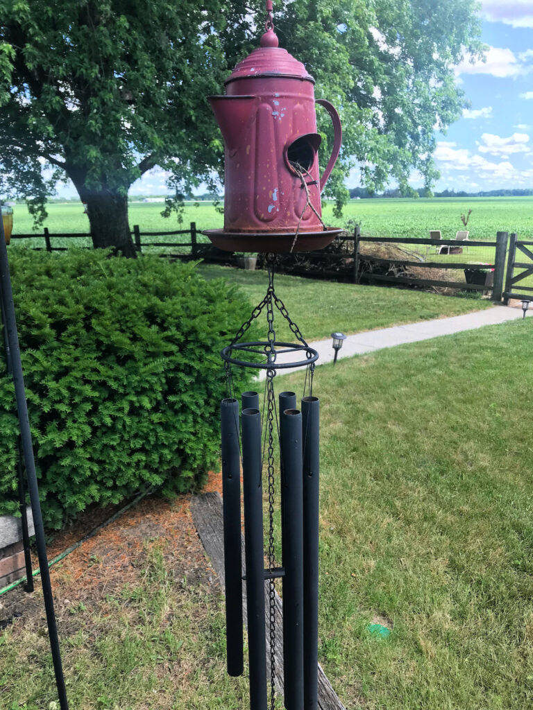 tea kettle bird feeder with wind chimes