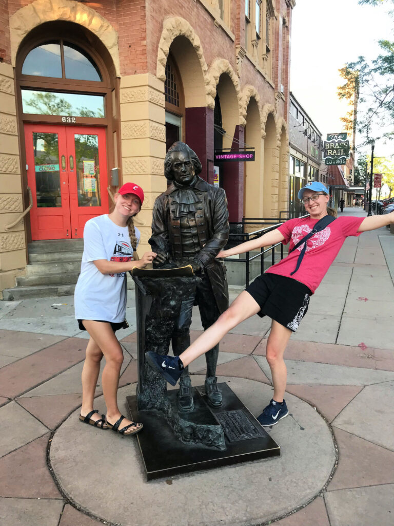girls near statue in Rapid City