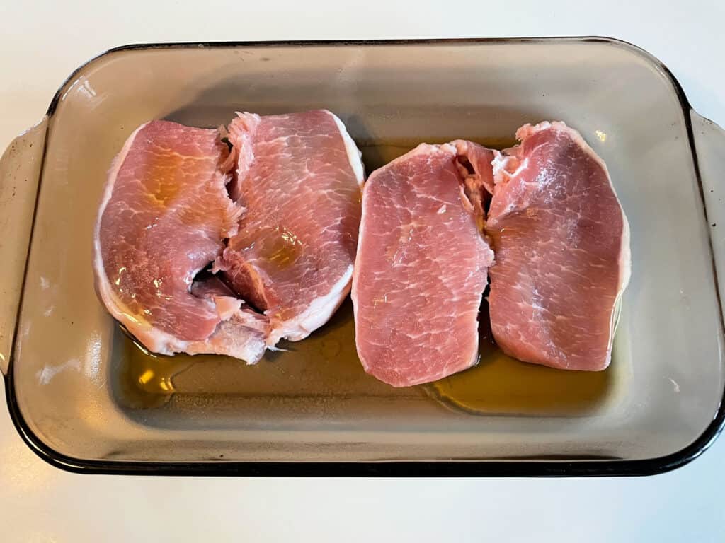 pork chops in a baking dish