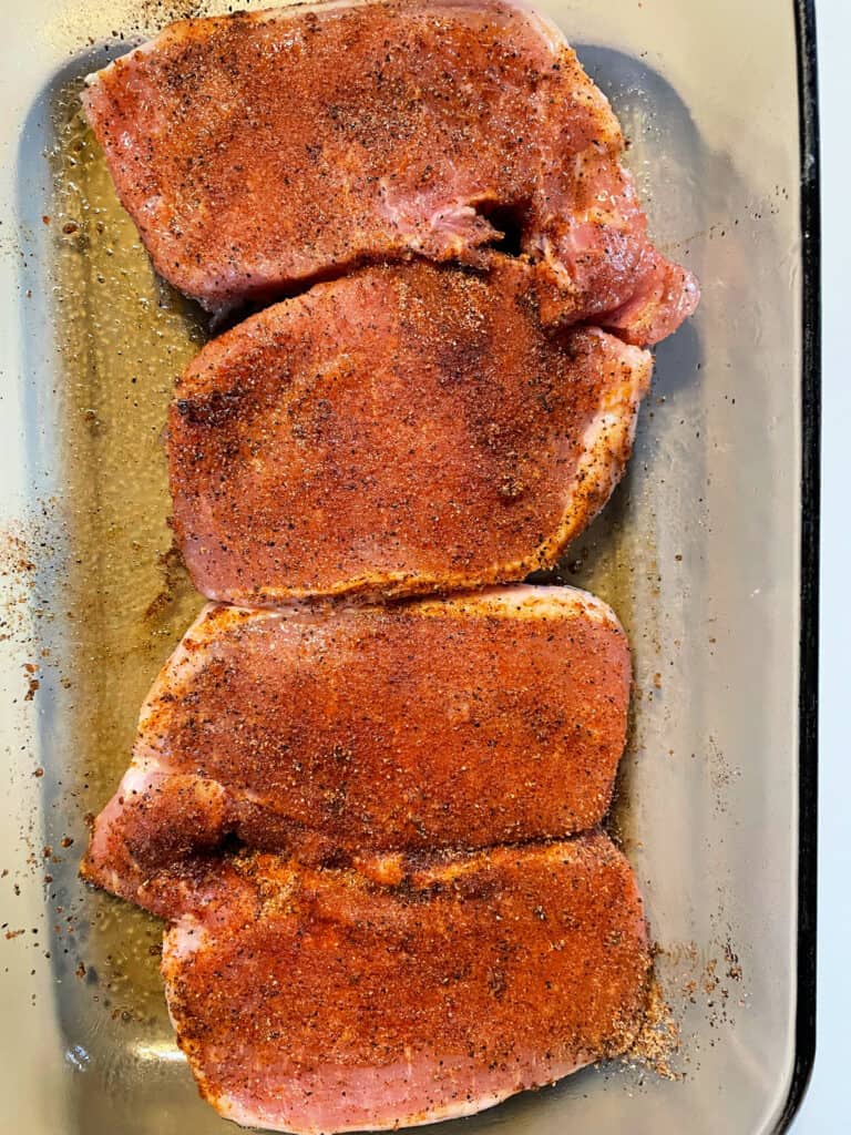 uncooked seasoned pork chops
